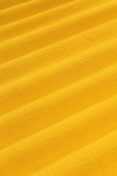 TUULI -double gauze tummakeltainen