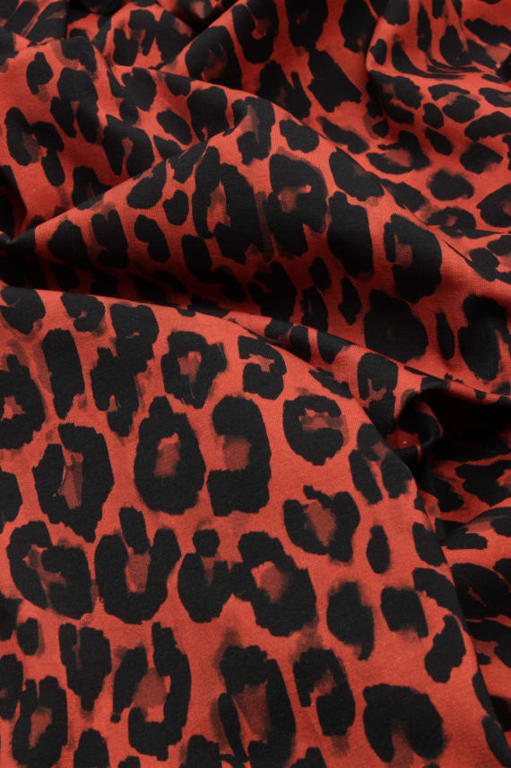 LEOPARDI -trikoo tummaoranssi