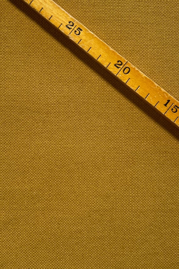 LINOTTO tummakeltainen